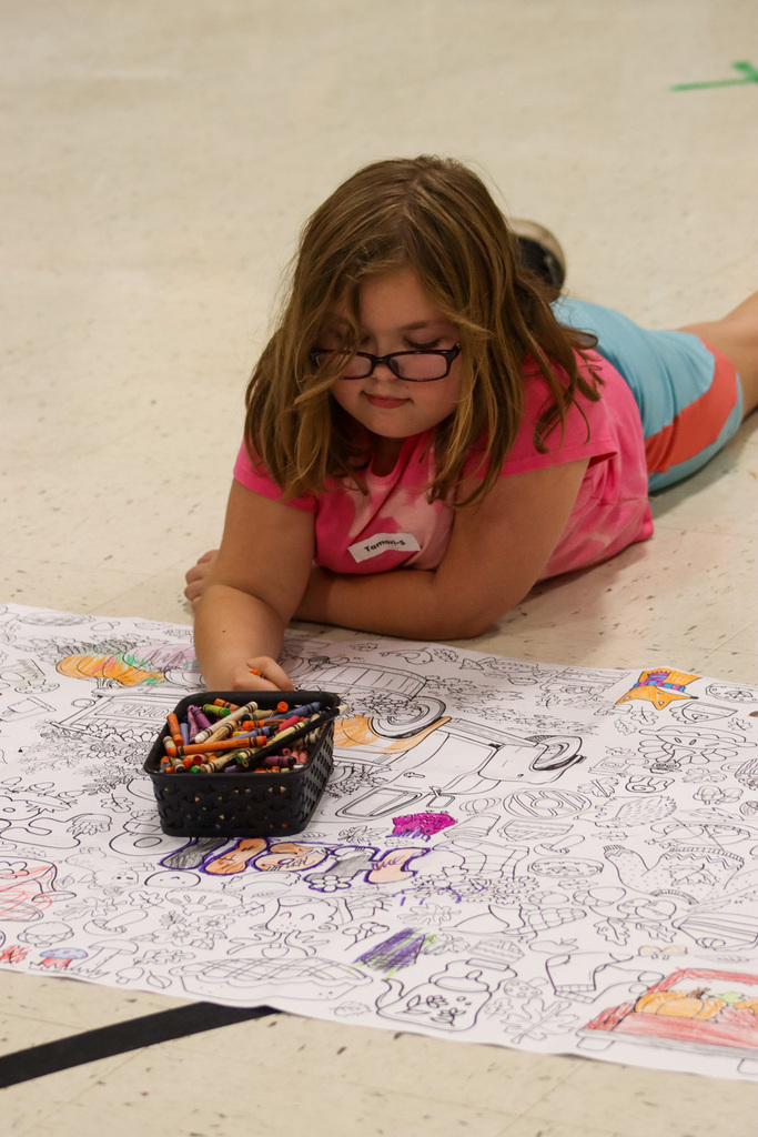 OMT student coloring during the OMT Literacy/STEM Event