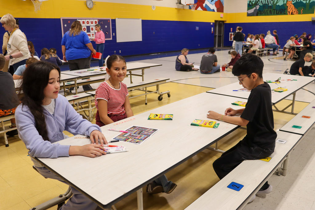 OMT students coloring during the OMT Literacy/STEM Event