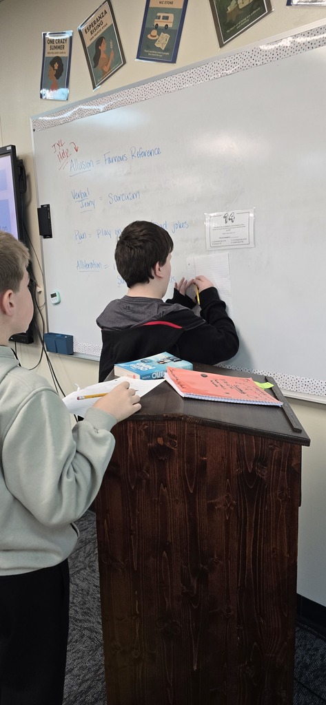 6th graders in language arts were challenged with a question trail. They worked in teams to figure out how figurative language was being used in song lyrics and poetry.