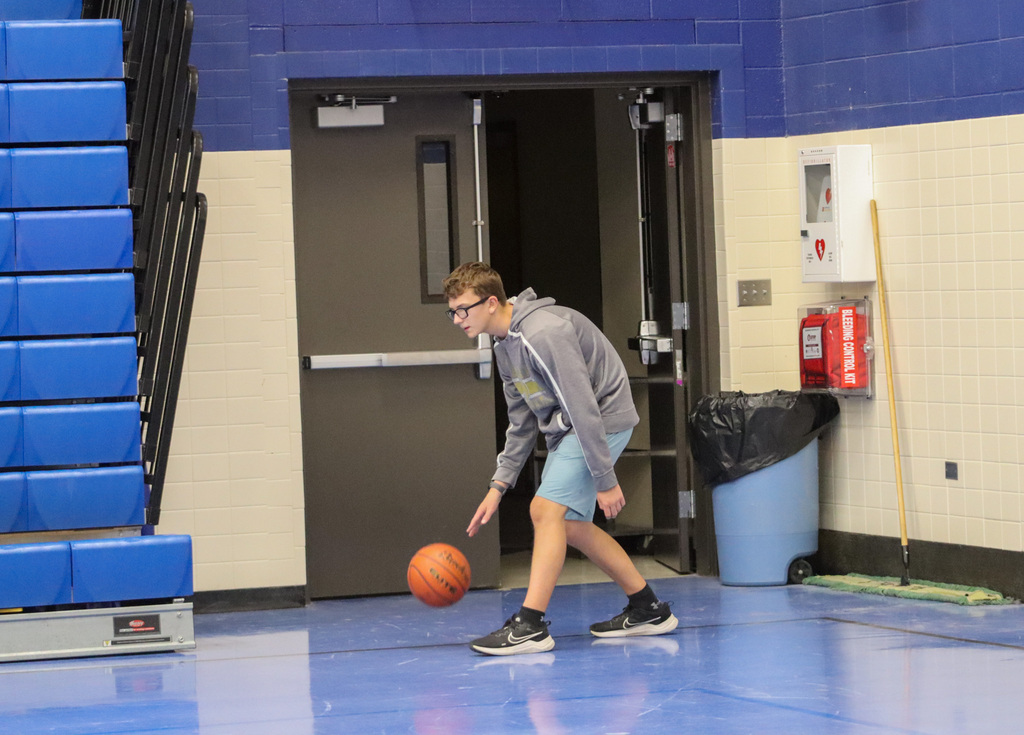 SMS student playing basketball at Family Fun Night