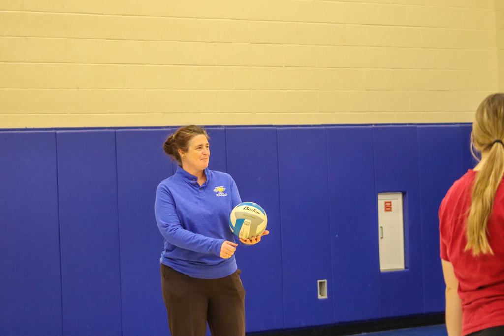 SMS students, family, and staff playing volleyball at Family Fun Night