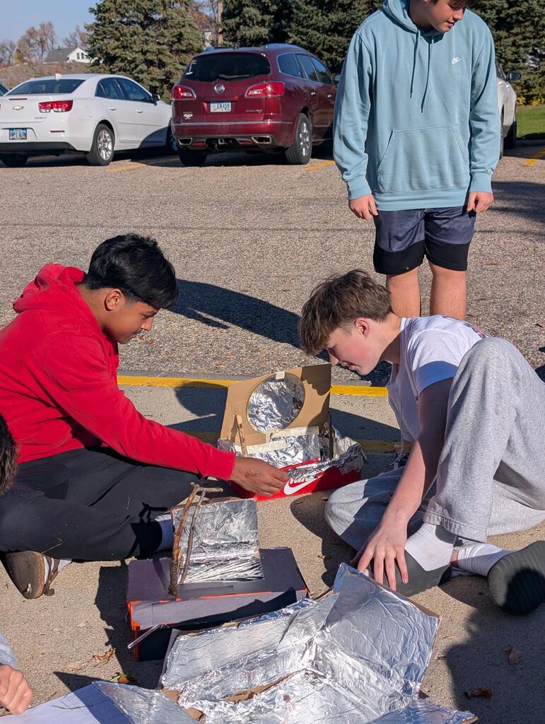 8th Graders wrapped up their unit on thermodynamics this morning by melting chocolate using the sun's radiation!