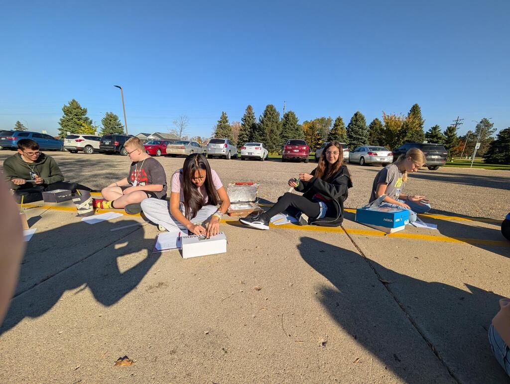 8th Graders wrapped up their unit on thermodynamics this morning by melting chocolate using the sun's radiation!