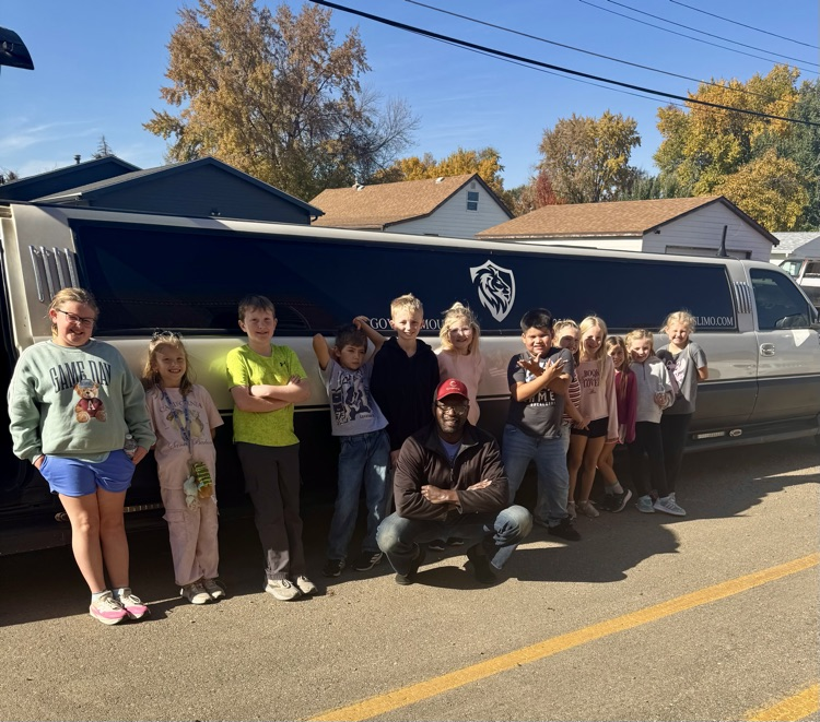 students in front of limo