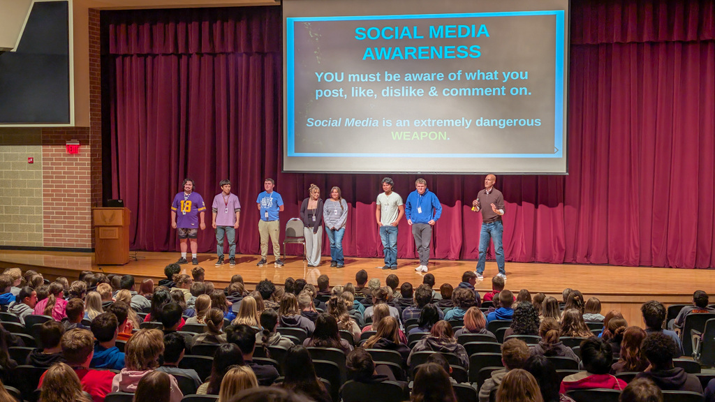 CHS students on stage during Mr. Leinweaver's presentation