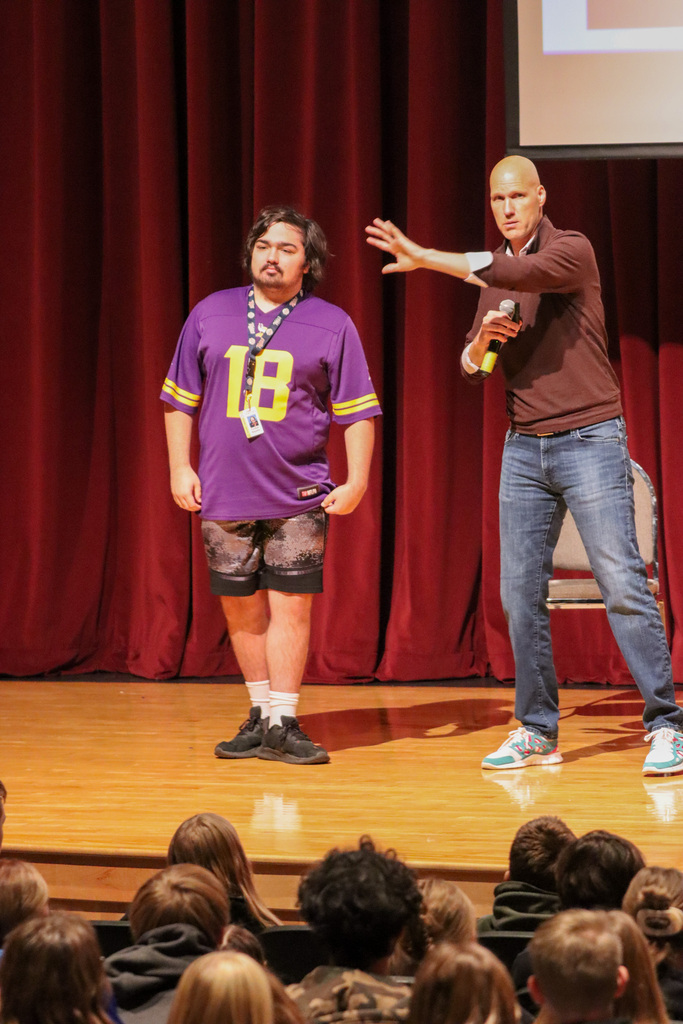 A CHS student on stage during Mr. Leinweaver's presentation