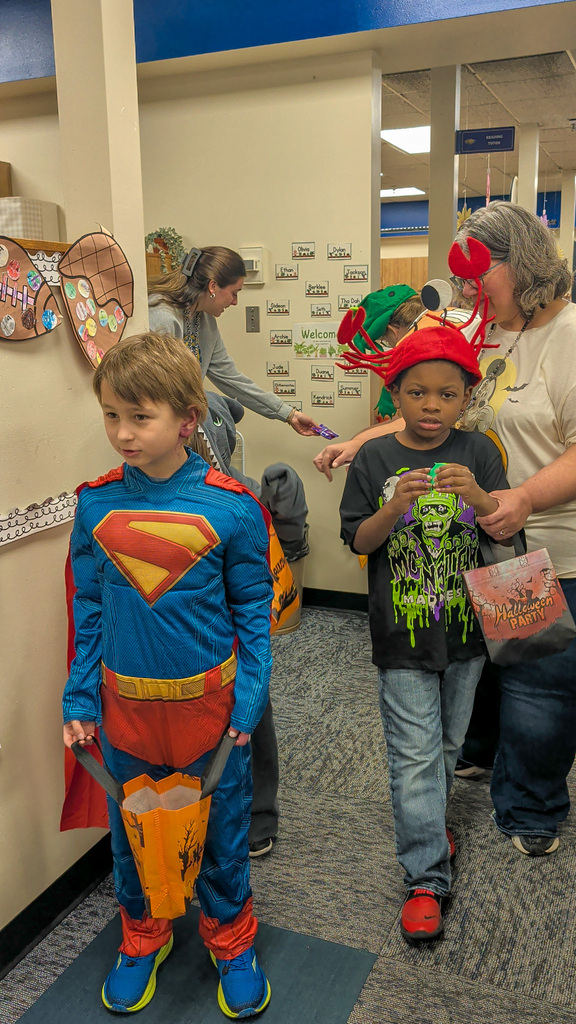 Students trick or treating at Lincoln Elementary