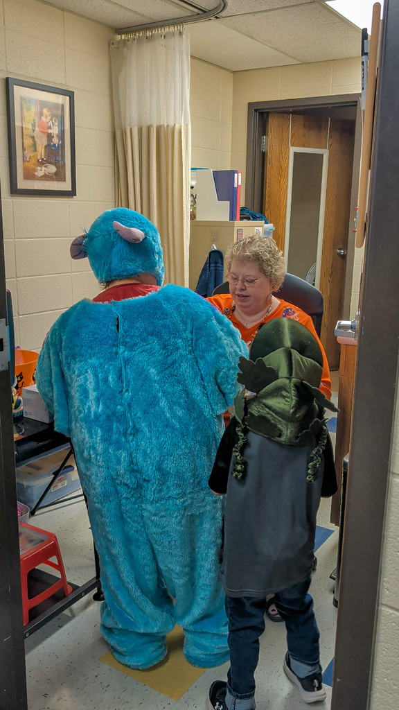 Students trick or treating at Lincoln Elementary