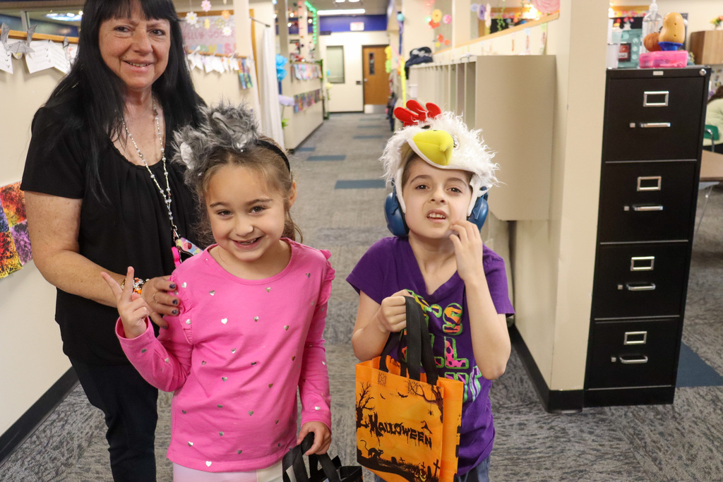 Students trick or treating at Lincoln Elementary