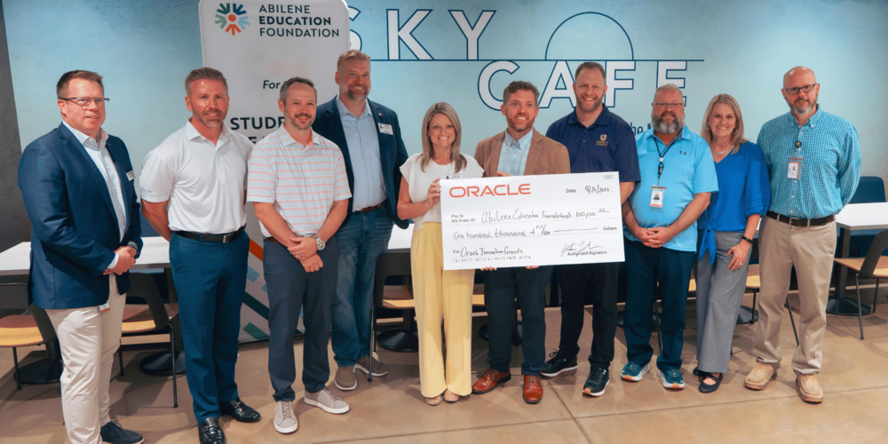 A photo of Abilene ISD, AEF, and Oracle representatives at the Sky Cafe at The LIFT