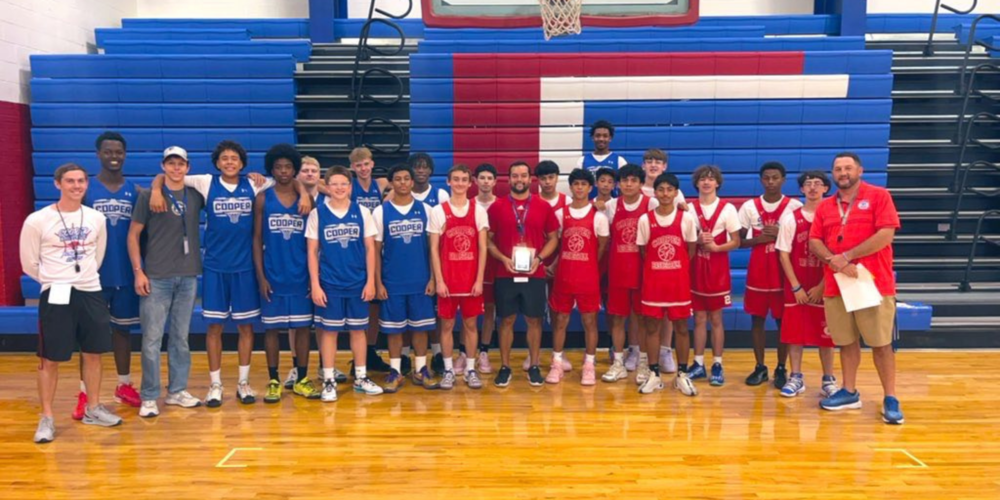 A photo of the Cooper HS basketball team and coaches