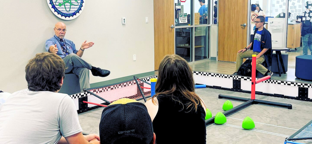 A photo of Mr. Haney in a robotics class