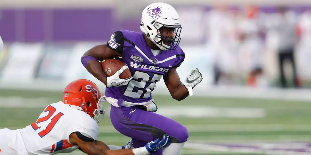 A photo of De'Andre Brown playing football for ACU