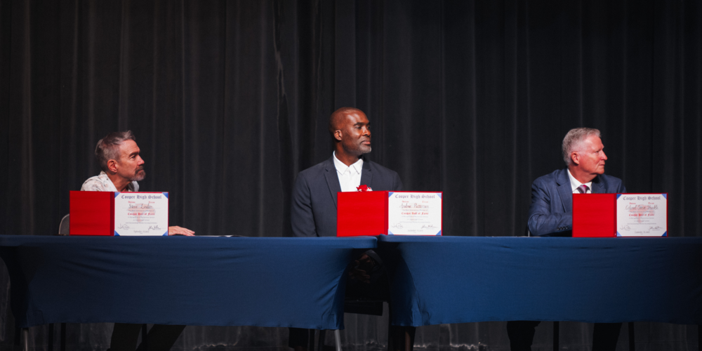 A photo of the three inductees at the ceremony