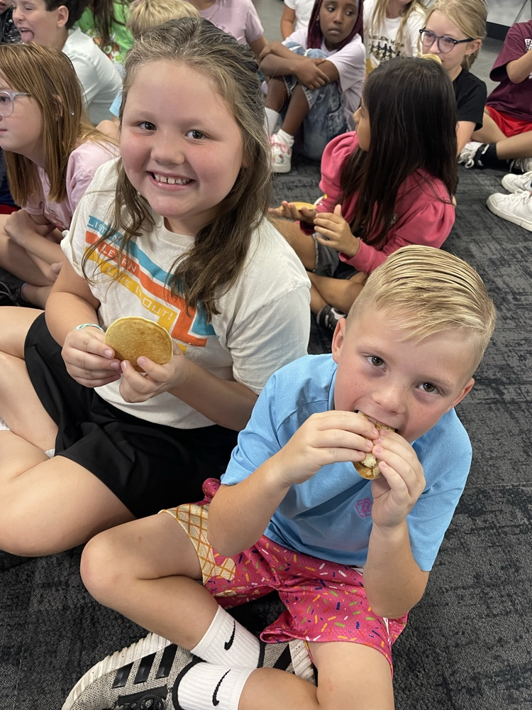 students eating pancakes 