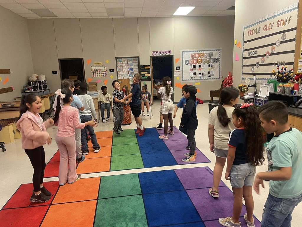 Students participate in a music activity