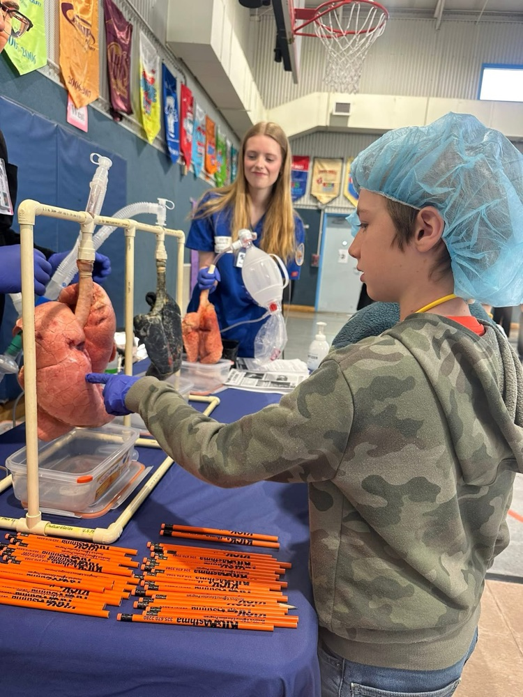 kid learning about a heart 