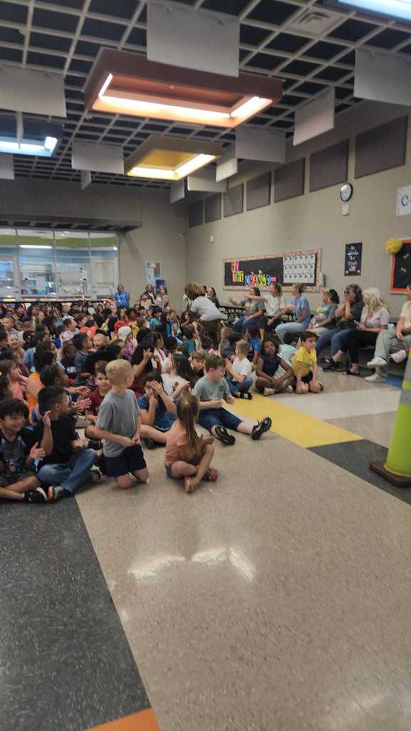 A group photo of students during the assembly