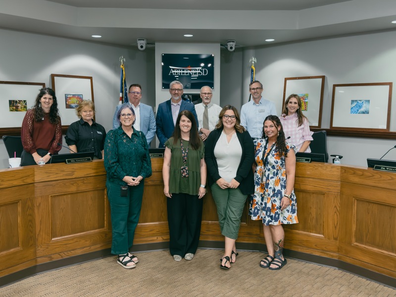 A photo of the TEA Review Committee Educators and the Board of Trustees