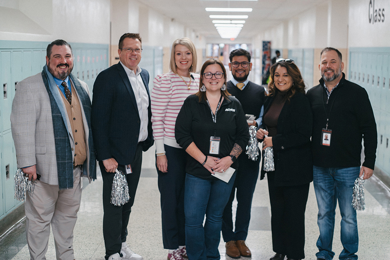 A group photo featuring Amy Jeansonne
