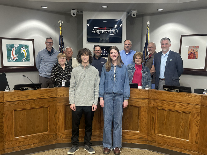 A photo of the Board of Trustees, Jackson Liske, and Olivia Ransford