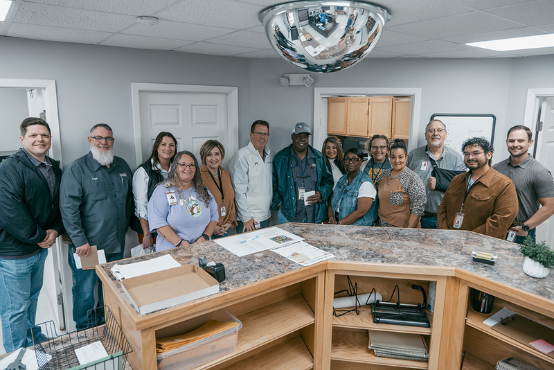 A photo of Mr. Cruse and members of the transportation department