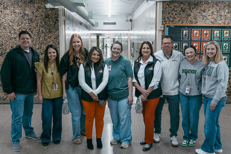 A photo of Hannah Horton and members of the prize patrol