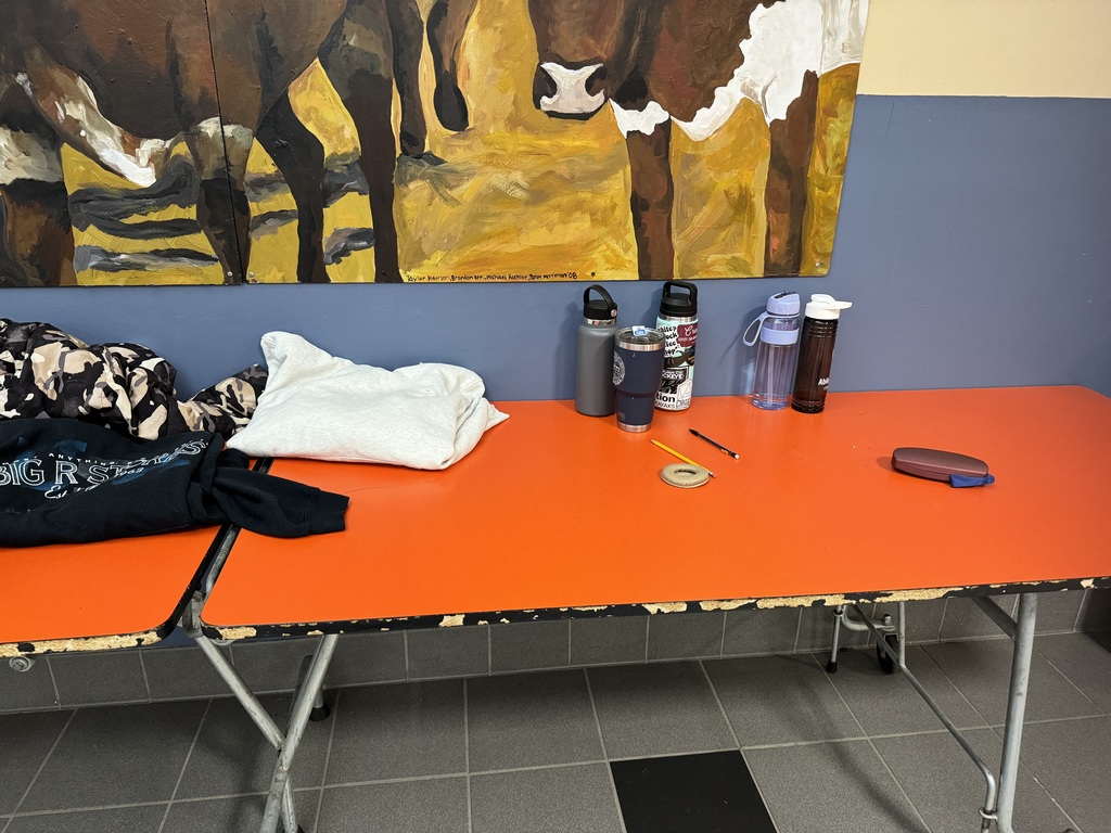 Lost and Found table with water bottles