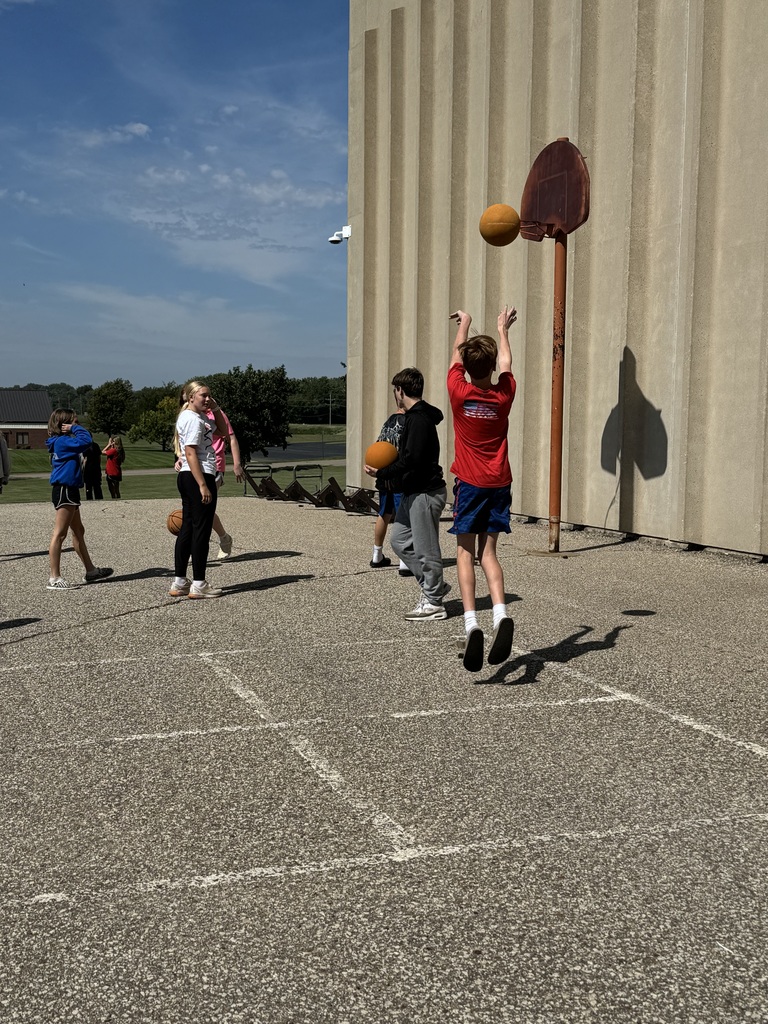 7th grade students shooting baskets