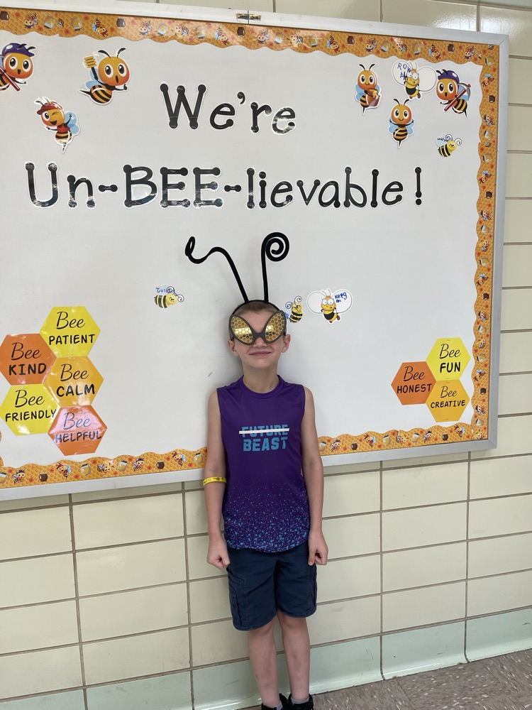 student with bee glasses