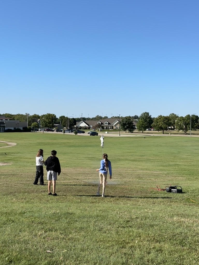 Students launching rocketsStudents launching rockets