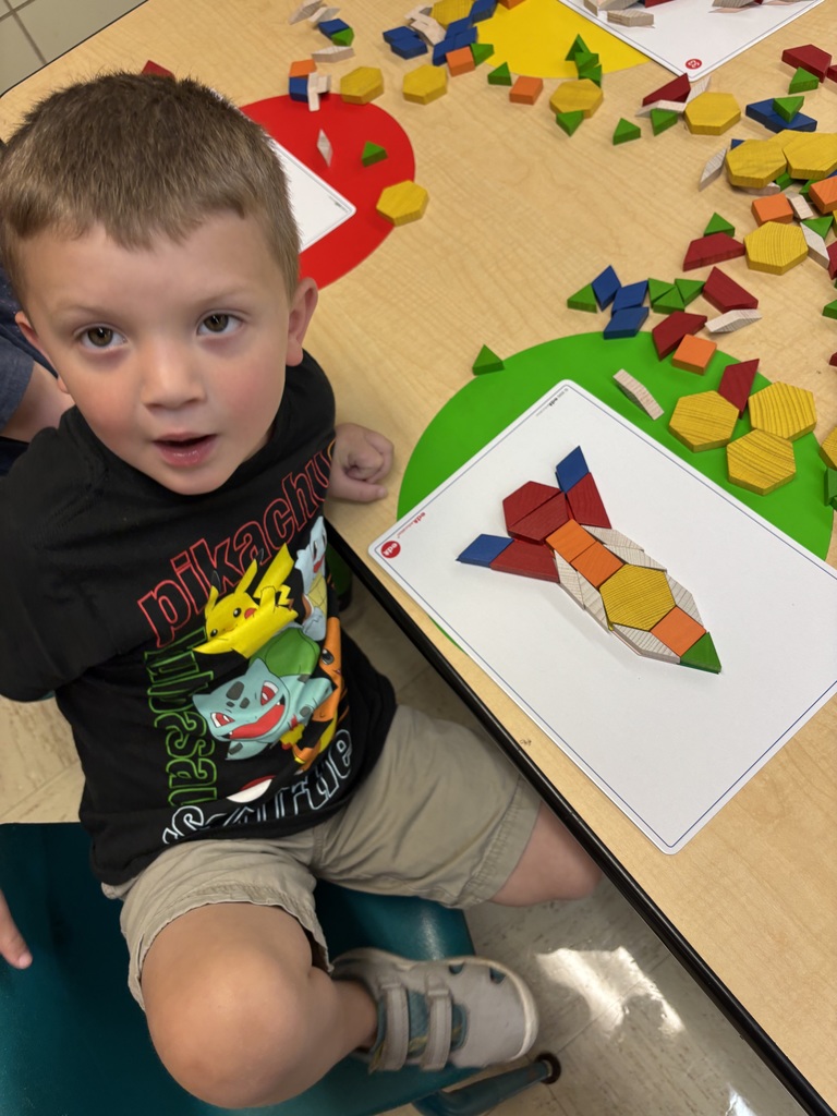 Working on our spatial awareness with shapes.