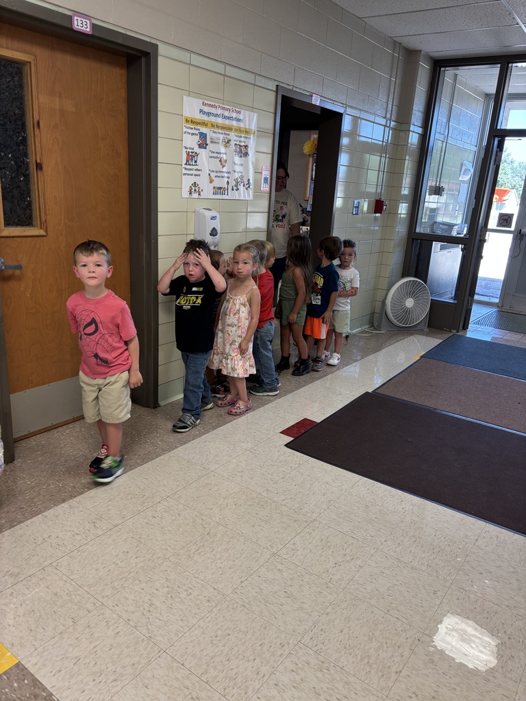 Preschoolers following the rules of the hallway!