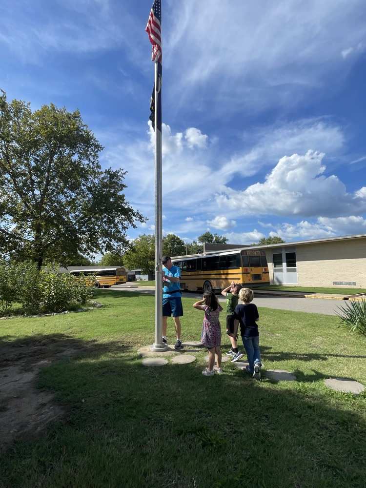 Taking down the flags.