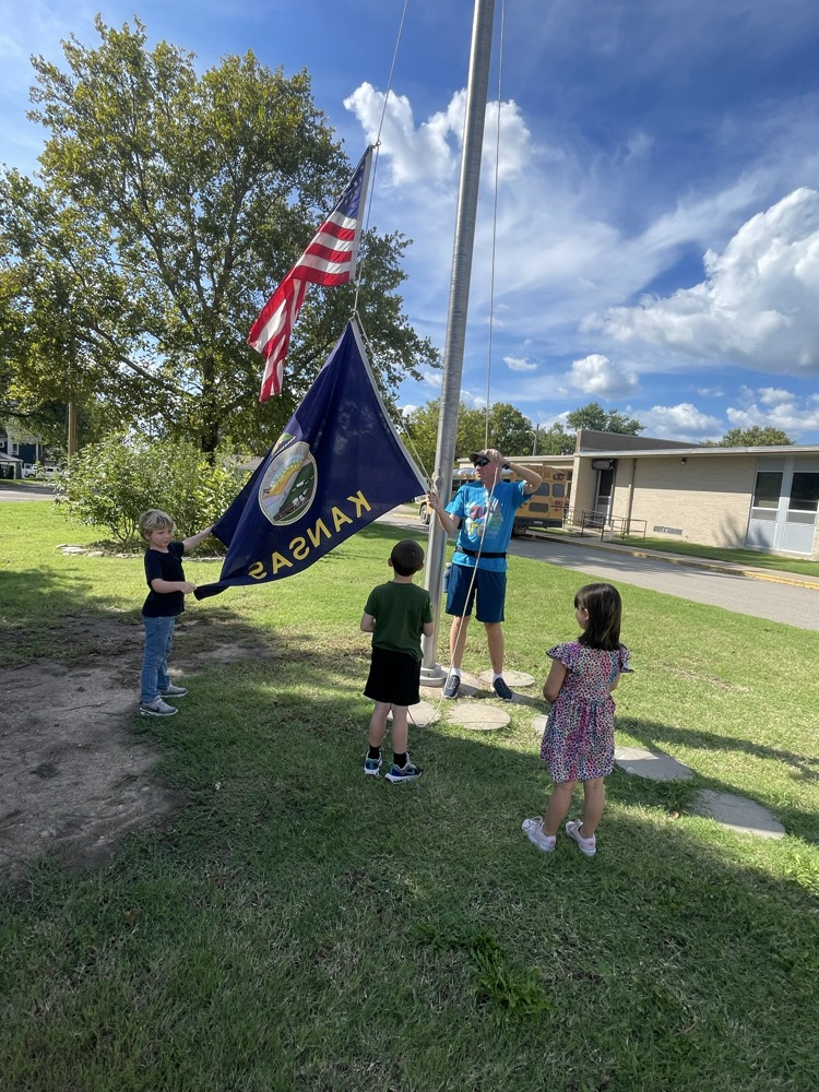 Waiting for the Kansas flag.