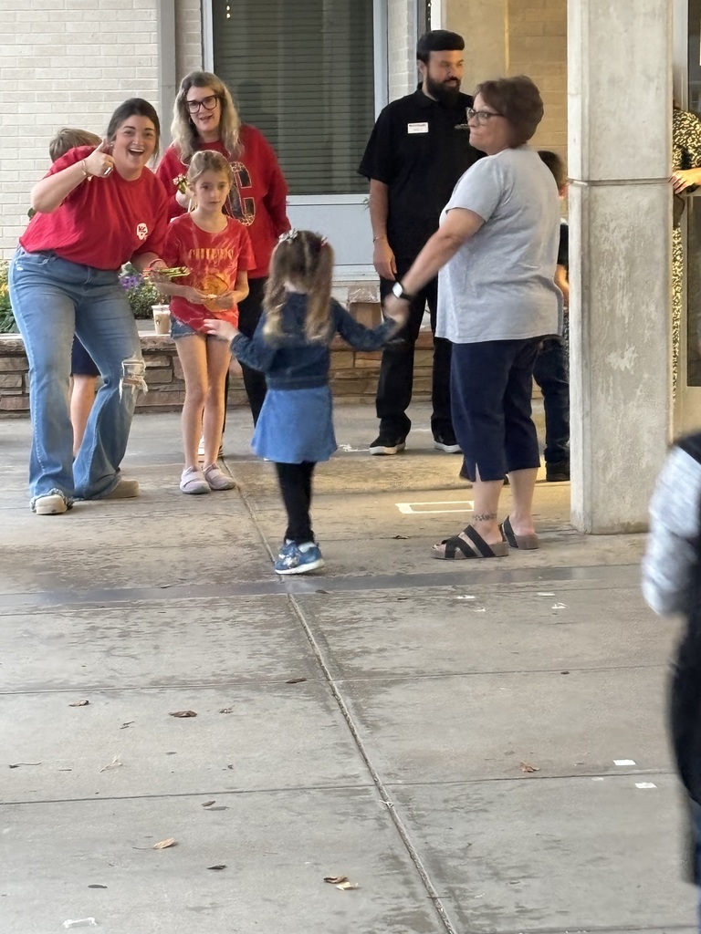 West's employees providing high fives!