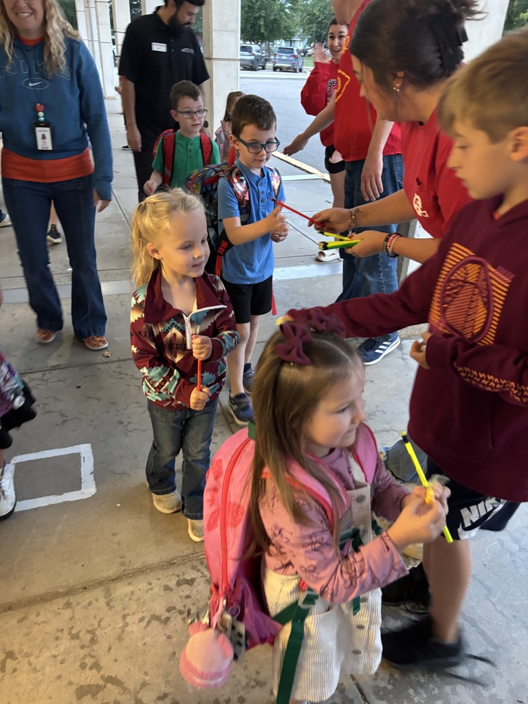 West's employees providing high fives!