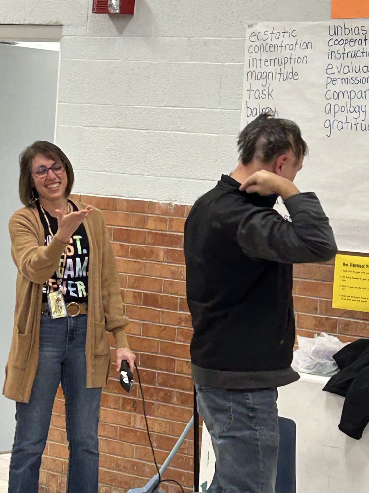 Mr. Meneley shaving his head