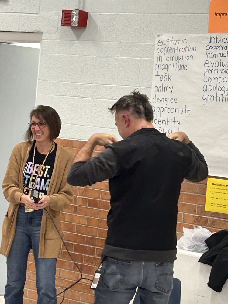 Mr. Meneley shaving his head