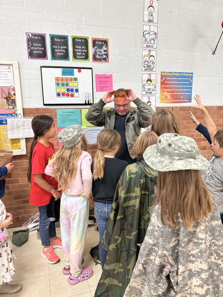 Trying on military gear