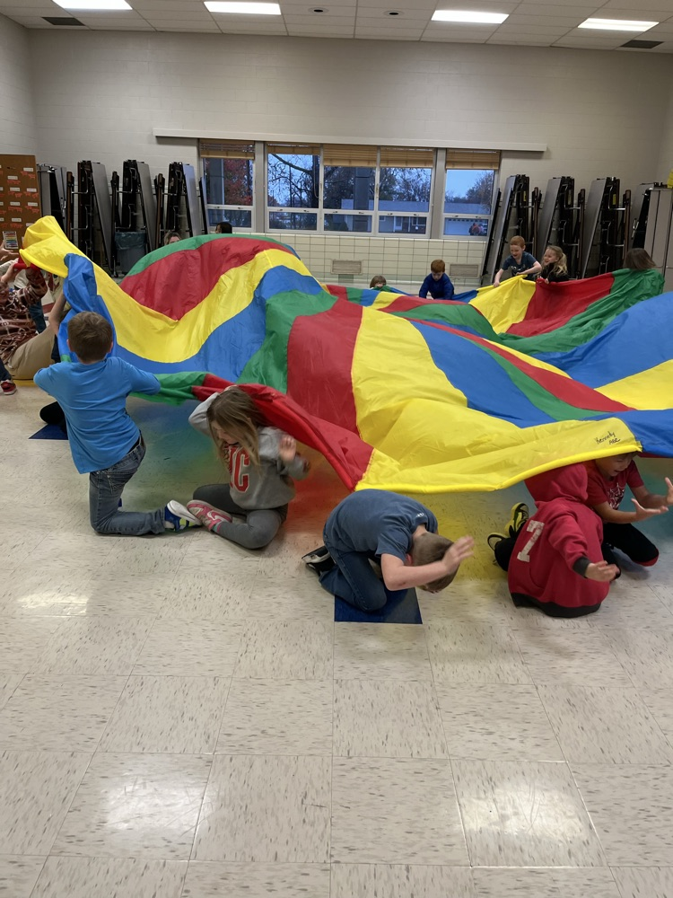 students under the parachute