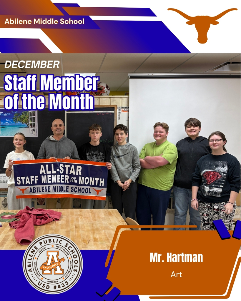 Picture of Mr. Hartman with students