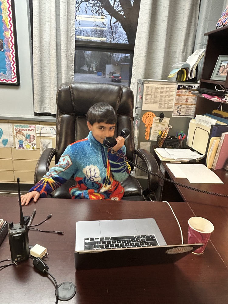 Principal for the day doing announcements