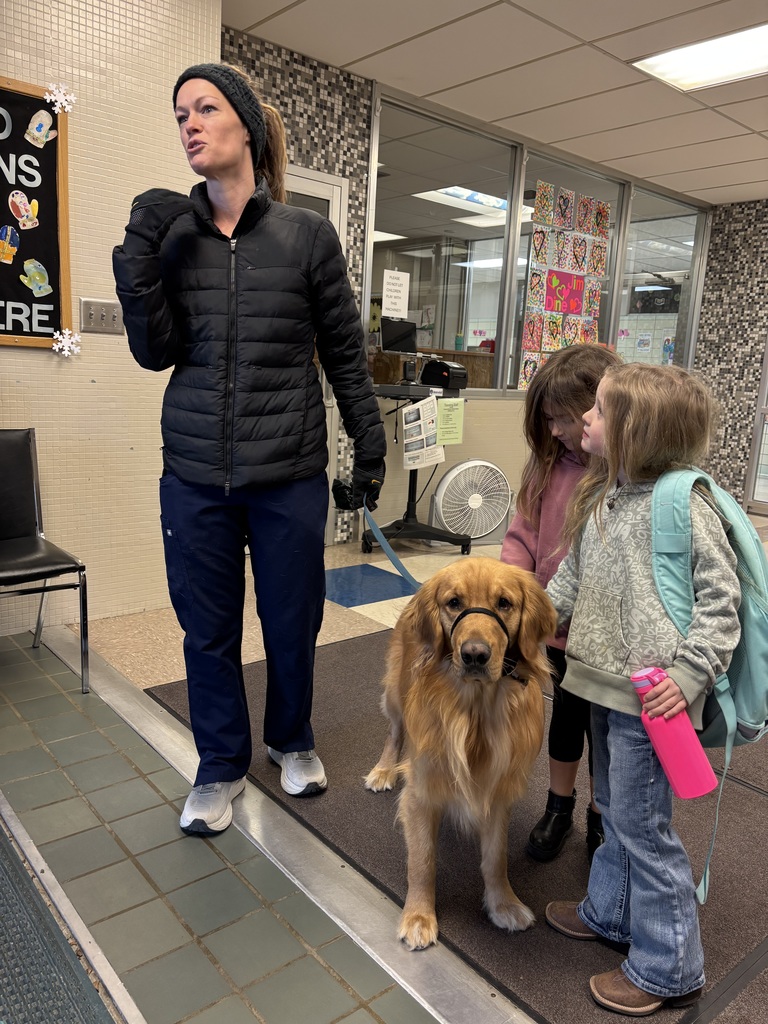 Rhett getting petted by students.