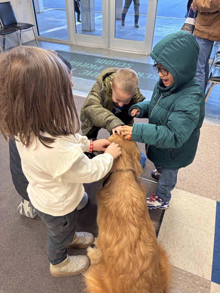 Rhett getting petted by students.