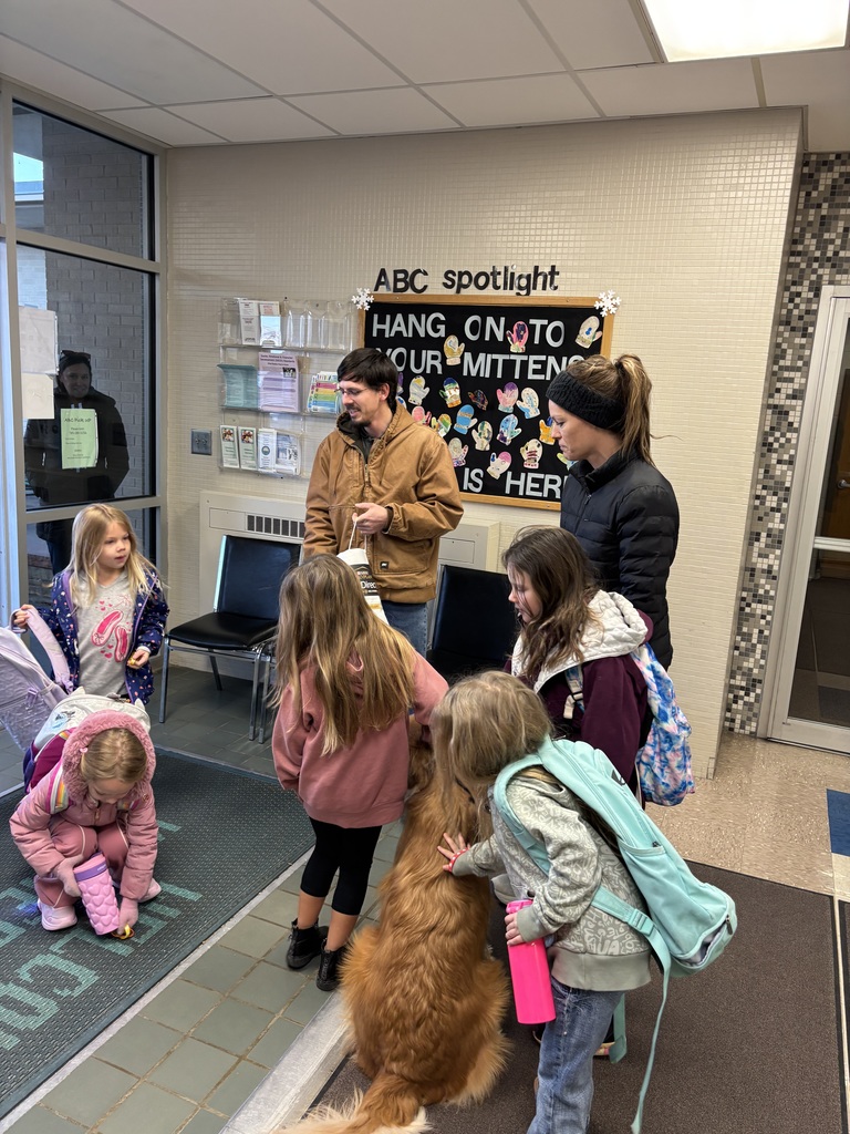 Rhett getting petted by students.