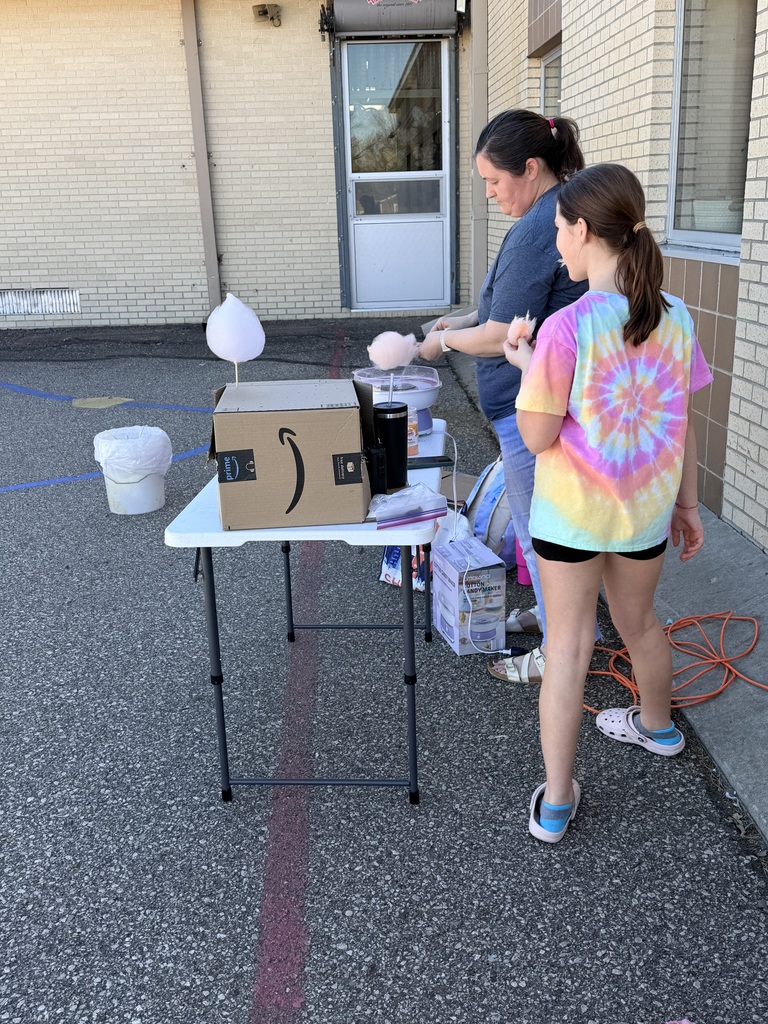 Cotton candy being made.