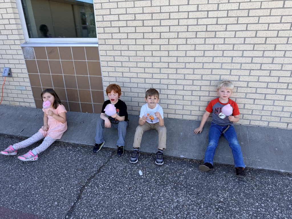 Students enjoying cotton candy.