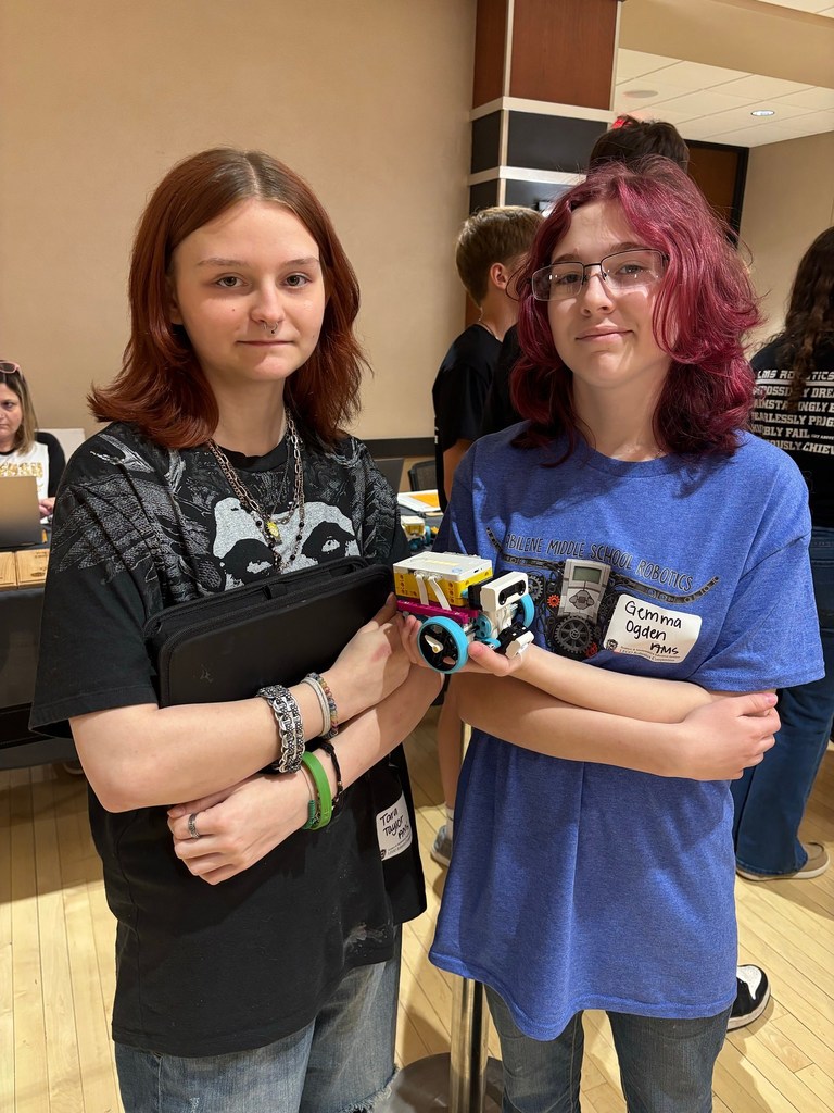 T. Taylor and G. Ogden with their 4th place robot from the "Mystery Maze" category
