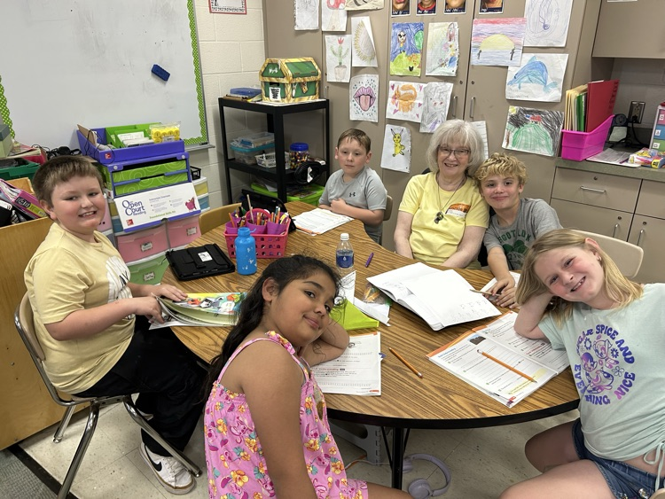 Mrs. Cook with students